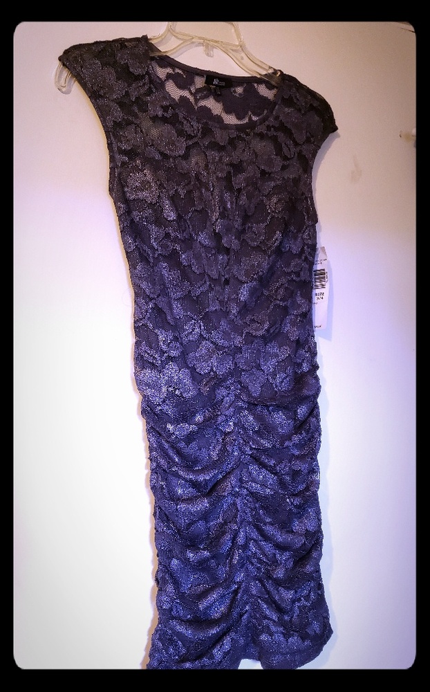 Gunmetal lace dress with heart shaped detail on fr